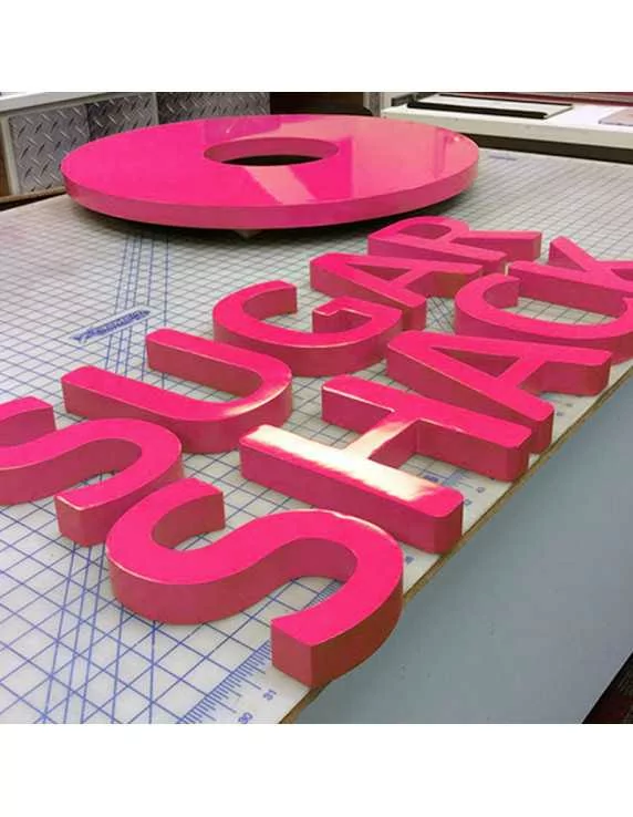 shaped letters with a lacquered effect shaped letters with a lacquered effect