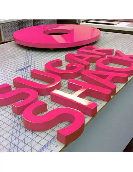 shaped letters with a lacquered effect shaped letters with a lacquered effect